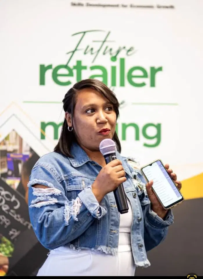Kelly Carstens-Rank speaking at a business event